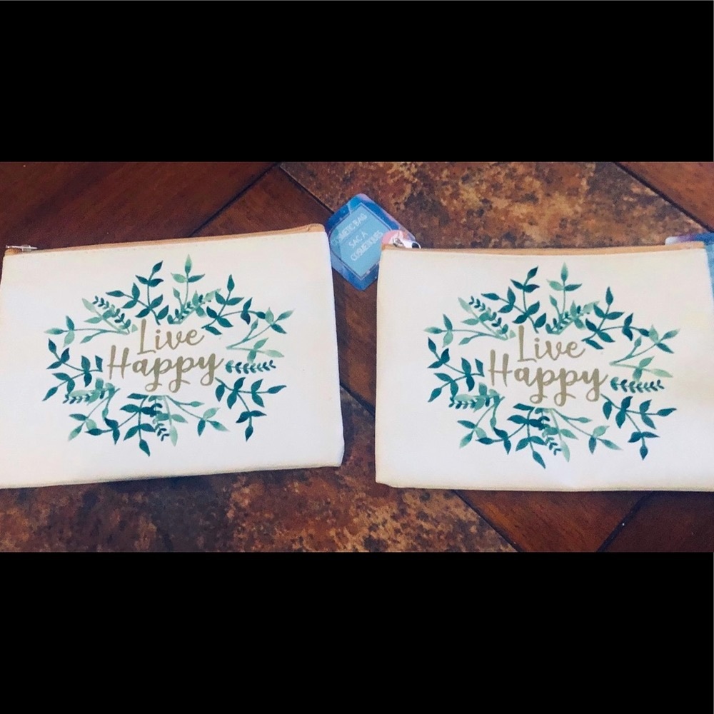 Set of 2 “Live Happy” Make-up bags.  NWT!